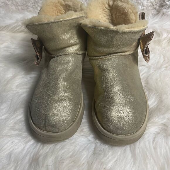 Ugg Mini Sequin Bow Bootie Gold Leather wool lining size10 - Picture 2 of 10